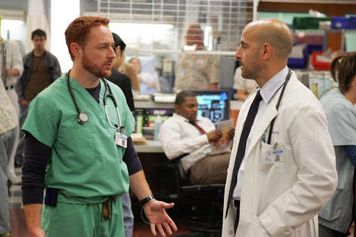 Scott Grimes is Dr Archie Morris and Stanley Tucci is Dr Kevin Moretti [ER Season 13]